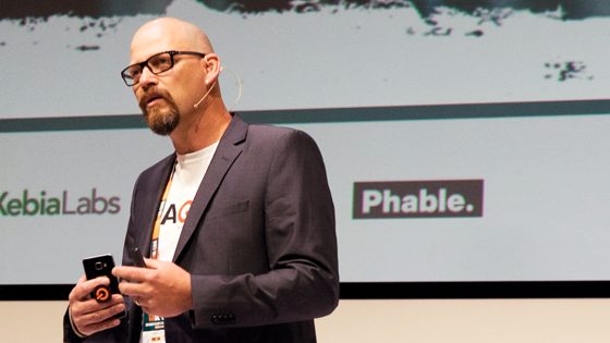 call for speaker Lars Kruse giving talk on Code-Conf